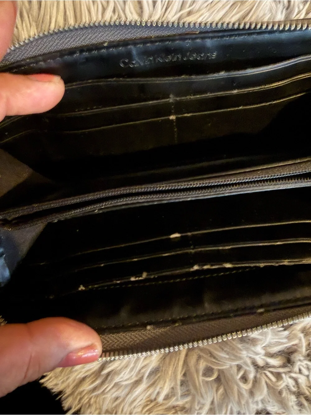 Calvin Klein Black Zip Wallet with Embossed cK